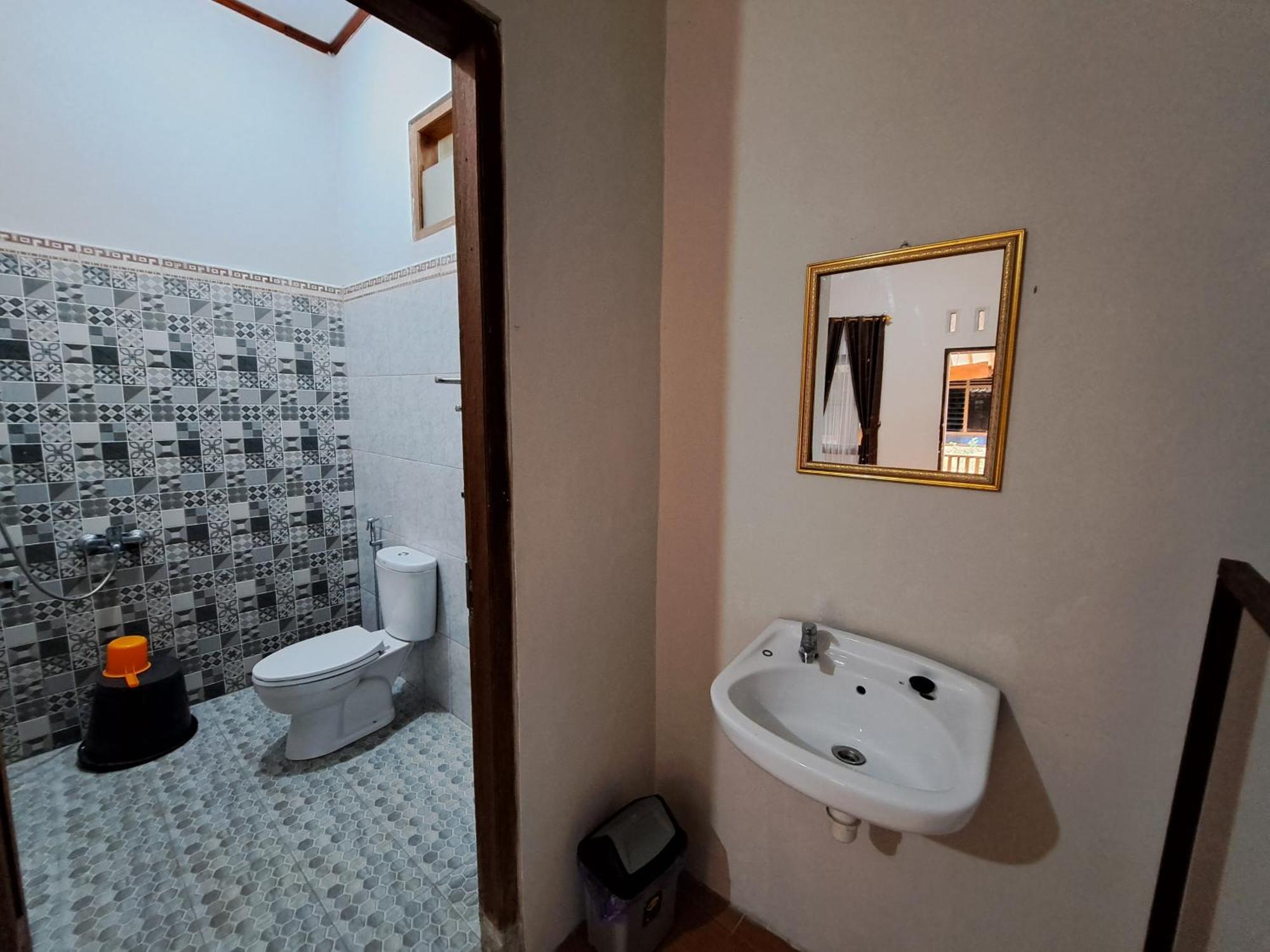 Romadhoni Homestay Маґеланґ Номер фото